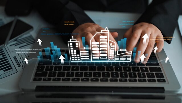 Digital transformation in business with hands on laptop and holographic cityscape for innovative solutions in technology and commerce growth strategies Gluon.