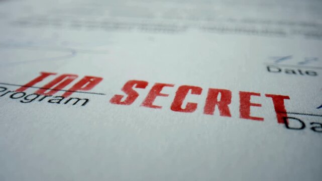 Closeup sign top secret on private document. Red prohibition stamp on text.