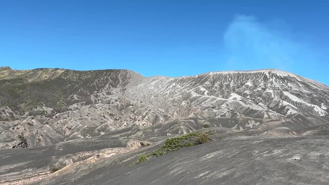 Majestic view of Mount Bromo volcanic landscape under a clear blue sky in East Java