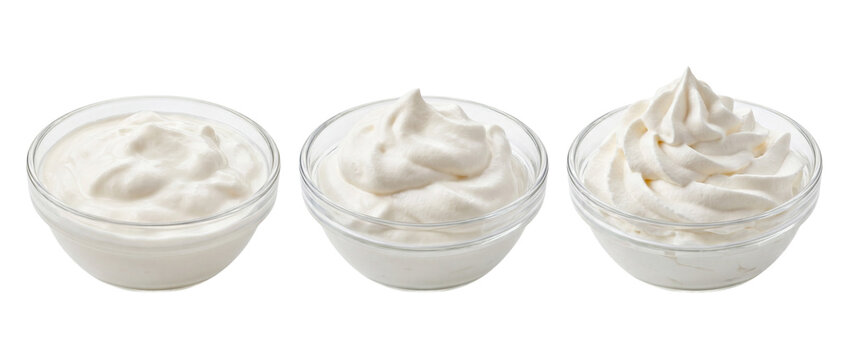 Three glass bowls filled with whipped cream on transparent background