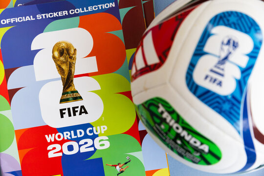 LONDON, UK - JUNE 2026: Official FIFA World Cup 2026 match ball displayed with tournament branding and sticker collection album
