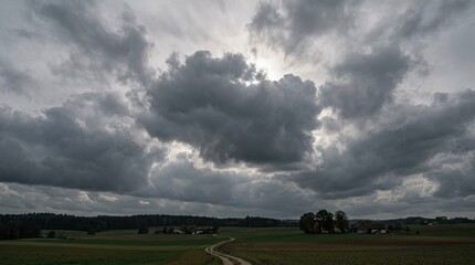 Naklejka premium storm clouds over the field