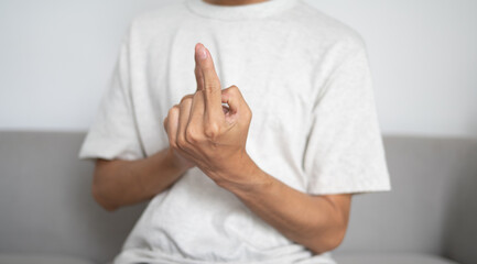 Fototapeta premium Close up of deaf man using sign language for ASL communication and learning concept.