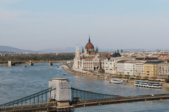Panoramic view of Budapest cityscape and Danube river with chain bridge and parliament