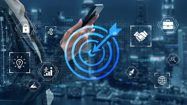 Business person using smartphone with target symbol overlay representing strategy, success, planning, and growth in a modern city background. Gluon.