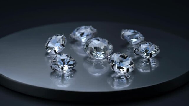 Lab grown diamonds sparkling and rotating on a reflective surface. Ethical and sustainable jewelry production concept.