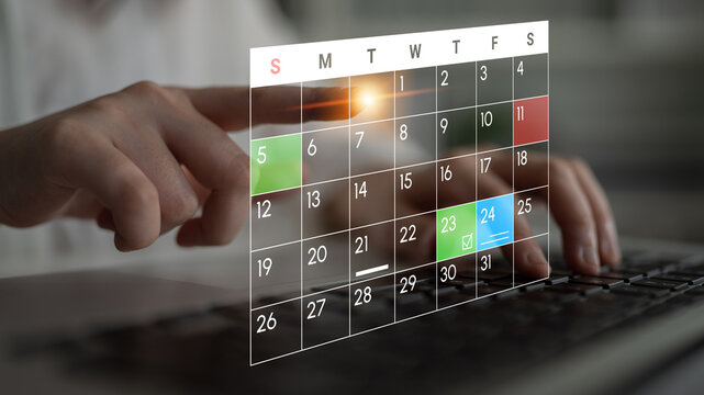 Modern Digital Calendar Interface with User Interaction on Keyboard Displaying Dates and Events for Productivity Enhancement. Entropy.