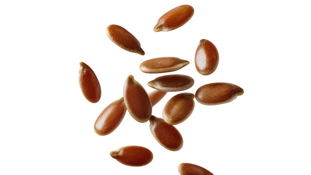 Scattered brown flax seeds close-up