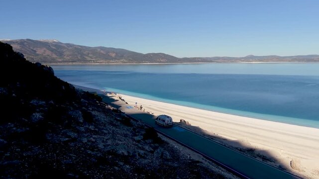 Experience the tranquility of Salda Golu Lake in Turkey with its crystal-clear waters and white sandy shores. This breathtaking location promises a relaxing retreat surrounded by nature wonders.