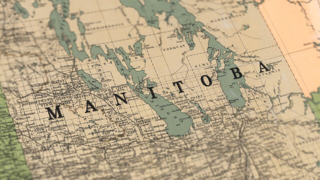 Macro View of Vintage Map Highlighting Manitoba Canada with Detailed Geographic Cartography.
