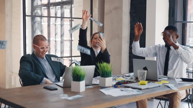 Happy office workers in co-working, enjoying successful deal, throwing money. Investments in startup, colleagues throwing dollars in air, successful deal, big salary and benefits for financial analyst