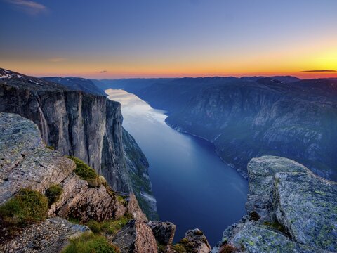 Rock face of Kjerag above Lysefjord at dusk, Lyseboten, Rogaland, Norway