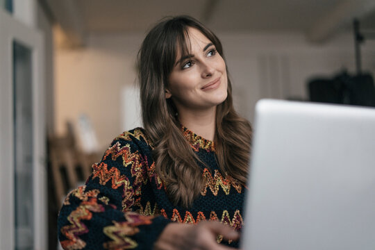 Pretty woman using laptop