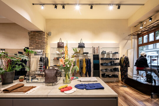 Interior of a modern concept store, displaying fashion