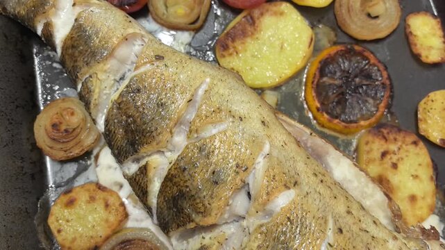 Succulent pike perch is expertly baked alongside vibrant vegetables. The aroma fills the kitchen as the dish transforms into a delightful feast, ready to be enjoyed.