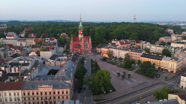An aerial flyover of St. Joseph's Cathedral in Krakow at dawn in the summer in Poland.