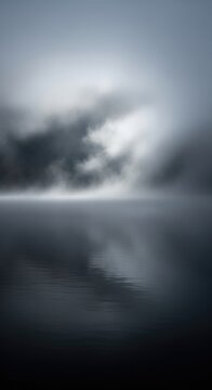 Atmospheric Landscape - Serene Fog Over Still Water Creates Dramatic Scene.