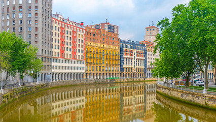 Obraz premium Nervion River, Bilbao city skyline, Spain