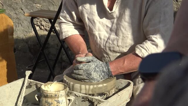craftsman modeling a vase