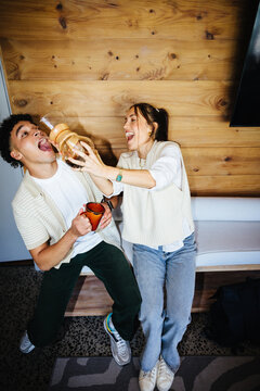 Young coworkers having fun during a lighthearted office break moment