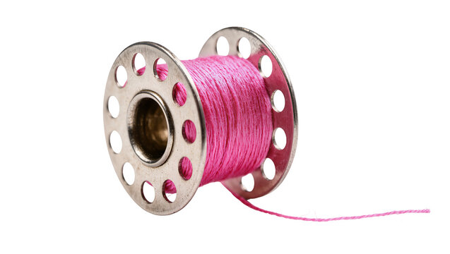Metal bobbin with pink thread and loose end