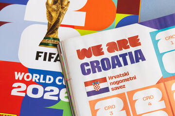 Naklejka premium LONDON, UK - JUNE 2026: Croatia team page with flag in the 2026 world cup sticker book