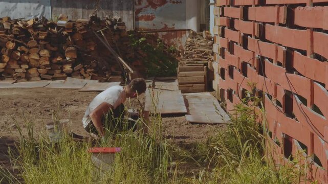 Weeding the ground, weeding the soil, clean the soil of weeds, remove weeds in the soil