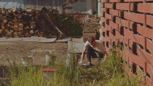Weeding the ground, weeding the soil, clean the soil of weeds, remove weeds in the soil
