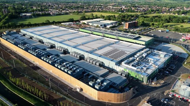 Close-up aerial view of hyper-scale data centre cooling infrastructure and HVAC chillers, London, UK