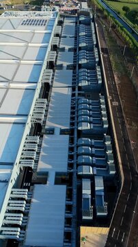 Close Up Aerial View of Massive Data Center External Cooling Hardware and Ventilation Units for AI Technology UK