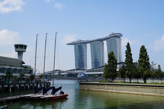Patriotic Singapore National Day background with Marina Bay skyline and blue sky