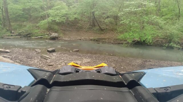 creekside parking an OHV, side by side in the Ozarks on a scenic spring-fed creek in Arkansas