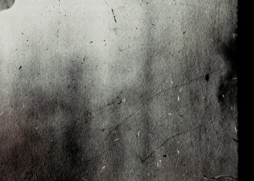 Vintage dirty damaged analog photo texture close up. Abstract old grimy photo background. Scratched glitch effect for design.	