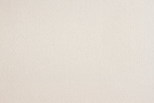 White paper texture, close up of fibers, grain, surface marks, copy space for paper texture design use. Natural background paper texture for packaging, stationery, branding, mockup layouts