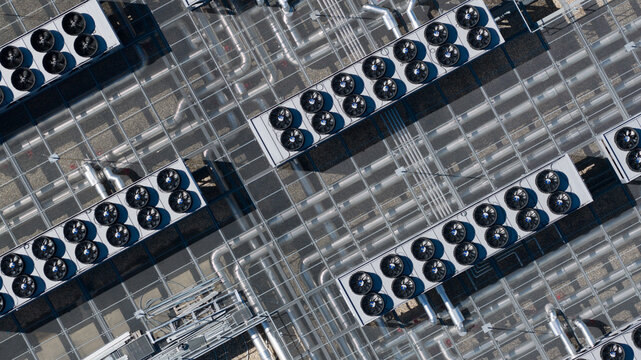 Aerial view of the industrial cooling units and ventilation fans on the roof of Switch Datacenters AMS4 in Diemen, Noord-Holland, Netherlands.