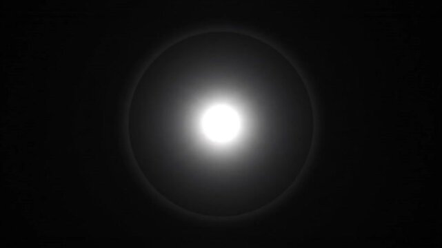 Abstract Pulsating Bright White Light Flare With Concentric Rings On Black Background For Visual Effects And Overlay