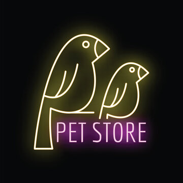 Neon sign illuminating pet store birds logo