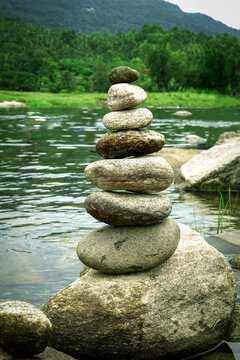 stack of stones on the riverside