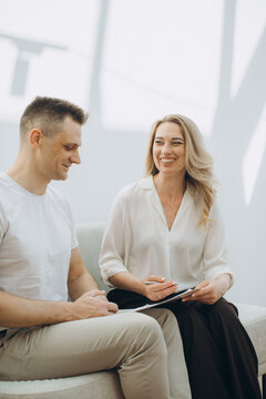 Psychologist having consultation session with smiling patient
