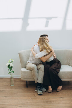 Couple embracing receiving psychological healing and support