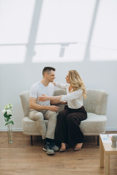 Woman comforting man during counseling session
