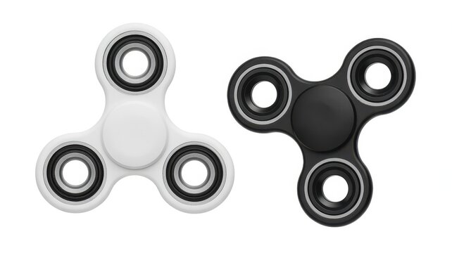Pair of black and white fidget spinner toys isolated on white background