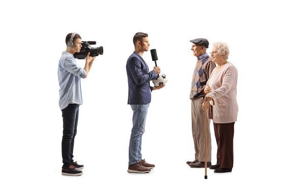 Sports reporter interviewing an elderly couple