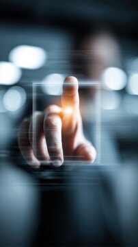 Person interacting with futuristic virtual touchscreen interface using finger gesture to select digital options in modern technology concept with blurred background