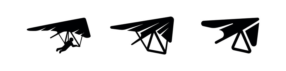 Set of three black silhouette hang glider icons on white background. © Lili