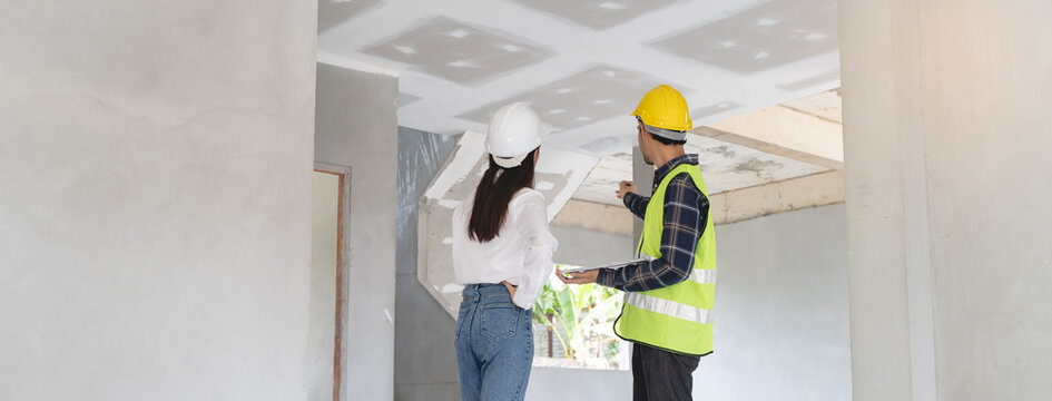 Client and Contractor discussing plan to renovation house