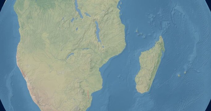 Mozambique on Globe. Zoom into the country with Earth spinning on dark background. Physical world map with Mozambique and label on it. Country view animation.