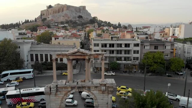 Aerial drone video of Hadrian&rsquo;s Arch in Athens, near Acropolis and Parthenon Acropolis hill, Plaka picturesque district below, Athens historic centre, Attica, Greece