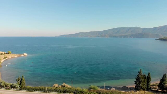 Aerial view of Beach Paralia Kechrion near Corinth Canal, Greece. Drone view from above. Summer holidays destination

