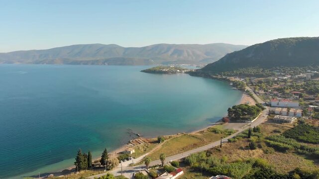 Aerial view of Beach Paralia Kechrion near Corinth Canal, Greece. Drone view from above. Summer holidays destination
